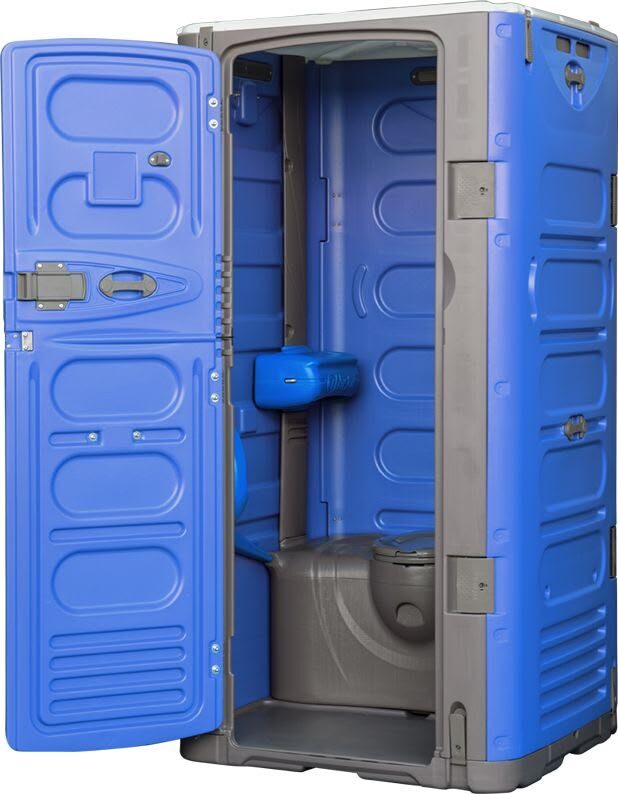 Interior of a luxury restroom trailer with sink, mirror, and finished flooring